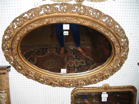 19th century giltwood and composite oval wall mirror(-)